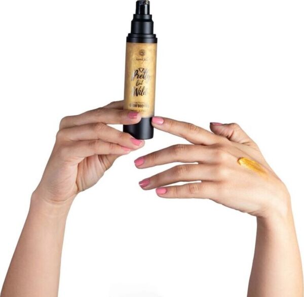 Secret Playn Glow Body Oil Pretty But Wild -hohtavan vartaloöljyn pakkaus