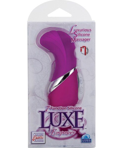 Vaaleanpunainen Calexotics Silicone Luxe Empower -vibraattori, jossa on kaareva, kohoraidallinen kärki